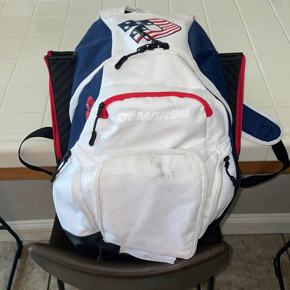 Demarini red, white, and blue baseball bat bag.  Used 2 months